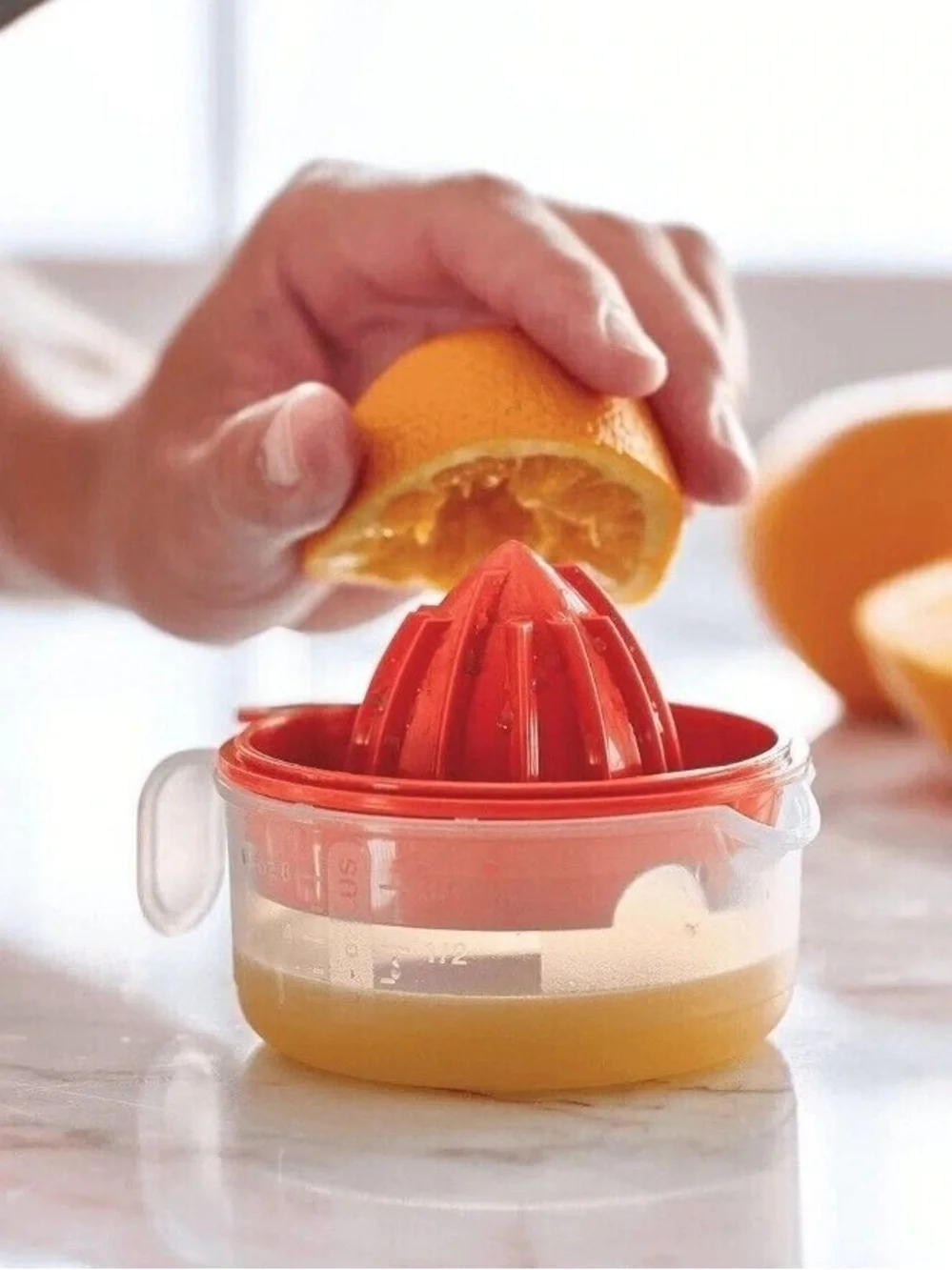 Tupperware All-In-One Mate, a multi-functional kitchen tool